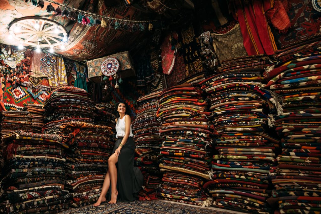 Girl in a carpet store happy woman customer choos